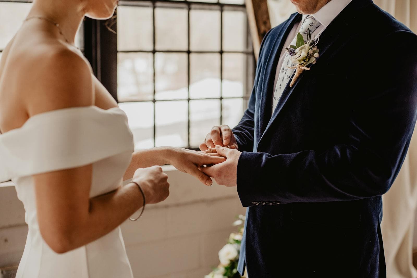 Wedding photographer reviewing a couple's session